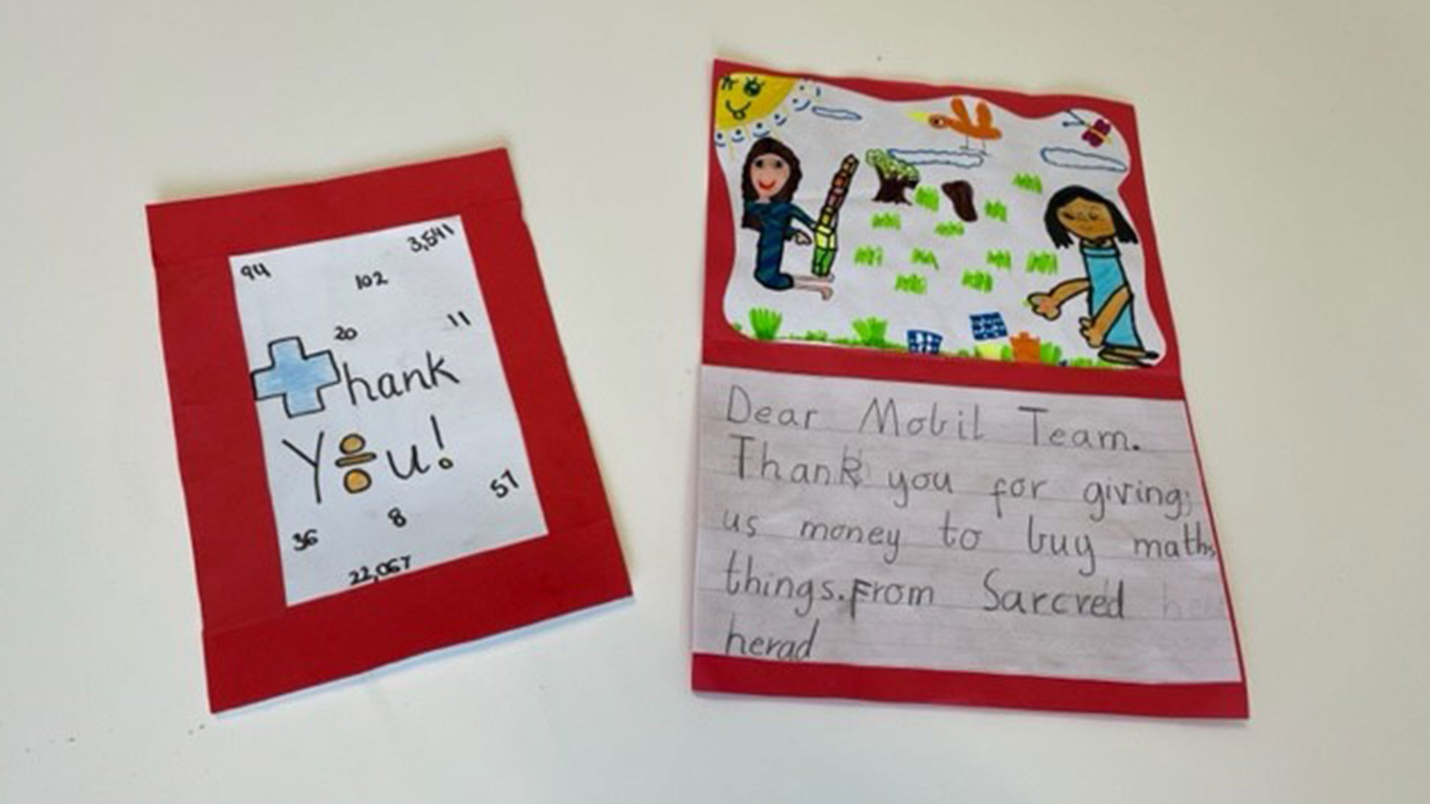 Thank you cards made by students were presented to the Mobil Altona team at the school assembly