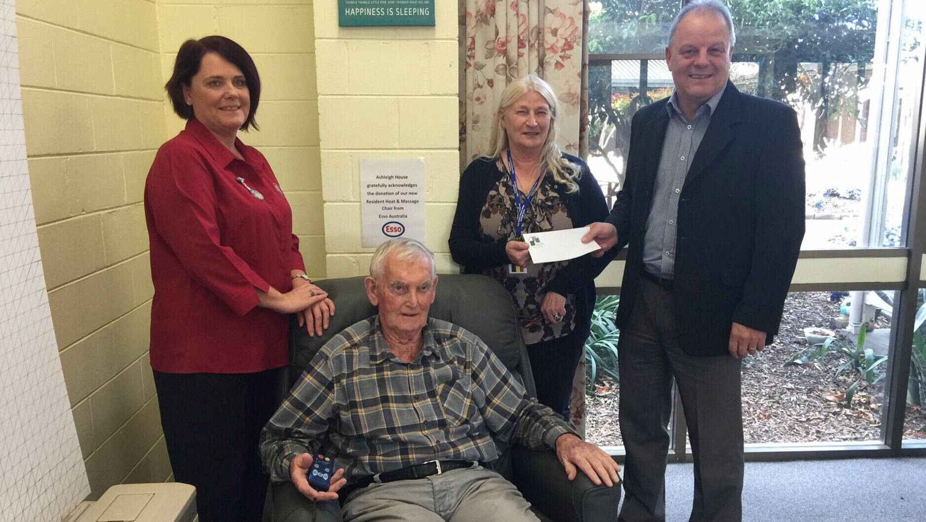 Image Photo  Pictured are Personal Care Attendant Chelsey Packham, resident Phil Gogoll, Sale Elderly Citizens Village Chairperson Ann Ferguson and Longford Plants Manager David Anderson.